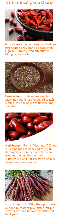 superfoods: goji berries, chia seeds, red beans, purple carrots